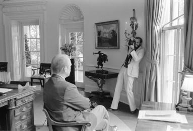 David Hume Kennerly shooting President Gerald R. Ford's first official portrait in the Oval Office, 8/17/1974